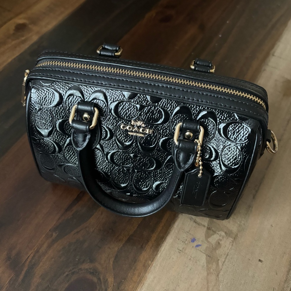 Coach black embossed mini rowan satchel